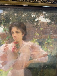 Louise De Hem (1866-1922): Portrait of a lady in a pink dress with a flower in her hand in a garden, pastel on paper marouflated on canvas