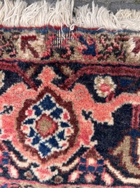 Een Perzisch Heriz tapijt met floraal decor, wol op katoen, eerste helft 20ste eeuw