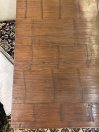 A Chinese bamboo and hardwooden opium table, 20th C.