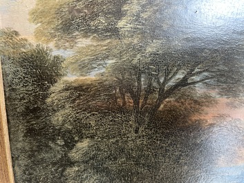 Flemish school: Two travelers and a donkey in a landscape, oil on panel, 17th C.