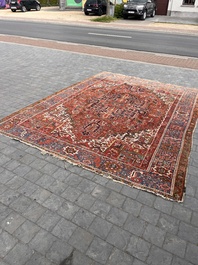 Een Perzisch Heriz tapijt met floraal decor, wol op katoen, 20ste eeuw