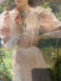 Louise De Hem (1866-1922): Portrait of a lady in a pink dress with a flower in her hand in a garden, pastel on paper marouflated on canvas