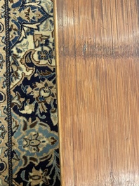 A Chinese bamboo and hardwooden opium table, 20th C.