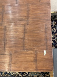 A Chinese bamboo and hardwooden opium table, 20th C.