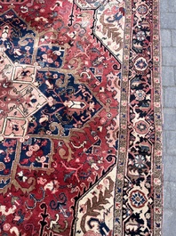 Een Perzisch Heriz tapijt met floraal decor, wol op katoen, eerste helft 20ste eeuw