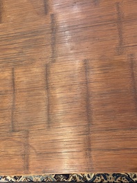 A Chinese bamboo and hardwooden opium table, 20th C.