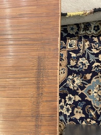 A Chinese bamboo and hardwooden opium table, 20th C.