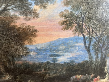 Flemish school: Two travelers and a donkey in a landscape, oil on panel, 17th C.