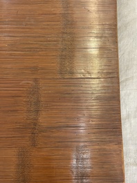 A Chinese bamboo and hardwooden opium table, 20th C.