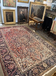 Een Perzisch Heriz tapijt met floraal decor, wol op katoen, 20ste eeuw