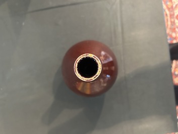 Trois vases en porcelaine monochrome jaune et sang-de-boeuf, un mont&eacute; en lampe, 19&egrave;me/20&egrave;me si&egrave;cle