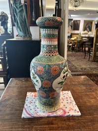 A pair of Chinese famille verte vases with birds among blossoming branches, Chenghua mark, 19th C.