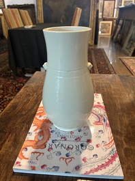 A Chinese white glazed 'hu' vase, 19th C.
