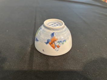 A Chinese doucai 'playing boys in a landscape' tea bowl, Wanli mark, 20th C.