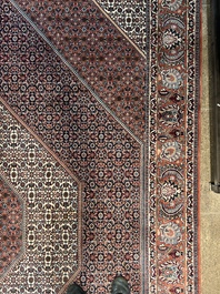 Een Perzisch Bidjar tapijt met floraal decor, wol op katoen, 20ste eeuw