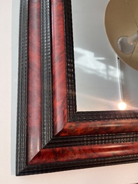 Een Vlaamse rechthoekige spiegel in schildpadfineer en ge&euml;boniseerd hout, 17de eeuw