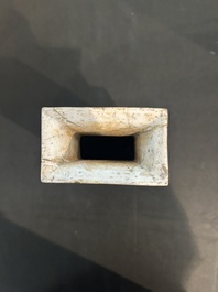 Trois vases en porcelaine monochrome jaune et sang-de-boeuf, un mont&eacute; en lampe, 19&egrave;me/20&egrave;me si&egrave;cle