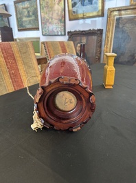 Trois vases en porcelaine monochrome jaune et sang-de-boeuf, un mont&eacute; en lampe, 19&egrave;me/20&egrave;me si&egrave;cle