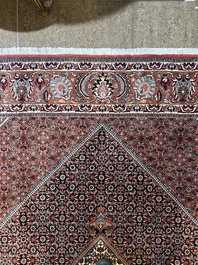 Een Perzisch Bidjar tapijt met floraal decor, wol op katoen, 20ste eeuw