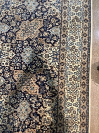 A Persian Nain rug with floral design, wool and silk on cotton, 20th C.