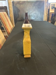 Trois vases en porcelaine monochrome jaune et sang-de-boeuf, un mont&eacute; en lampe, 19&egrave;me/20&egrave;me si&egrave;cle