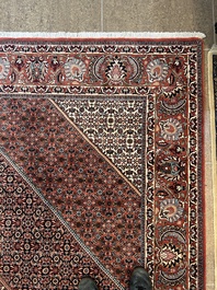 Een Perzisch Bidjar tapijt met floraal decor, wol op katoen, 20ste eeuw