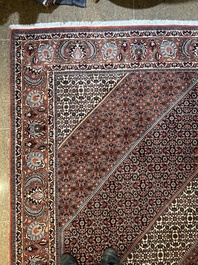 Een Perzisch Bidjar tapijt met floraal decor, wol op katoen, 20ste eeuw