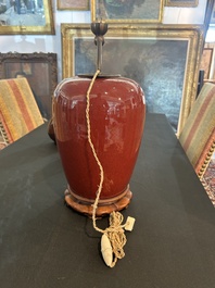 Trois vases en porcelaine monochrome jaune et sang-de-boeuf, un mont&eacute; en lampe, 19&egrave;me/20&egrave;me si&egrave;cle