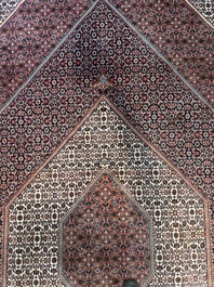 Een Perzisch Bidjar tapijt met floraal decor, wol op katoen, 20ste eeuw