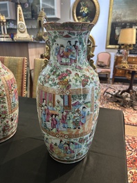A pair of Chinese Canton famille rose vases with palace scenes and floral design, 19th C.