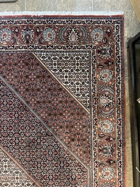 Een Perzisch Bidjar tapijt met floraal decor, wol op katoen, 20ste eeuw