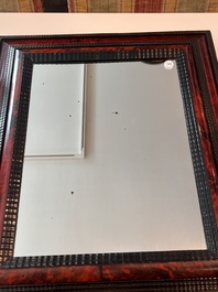 Een Vlaamse rechthoekige spiegel in schildpadfineer en ge&euml;boniseerd hout, 17de eeuw