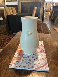 A Chinese white glazed 'hu' vase, 19th C.