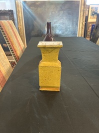 Trois vases en porcelaine monochrome jaune et sang-de-boeuf, un mont&eacute; en lampe, 19&egrave;me/20&egrave;me si&egrave;cle