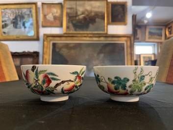A Chinese famille rose '100 butterflies' vase and two bowls with peaches and balsam pears, Qianlong mark, 20th C.