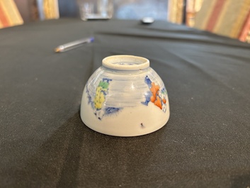 A Chinese doucai 'playing boys in a landscape' tea bowl, Wanli mark, 20th C.