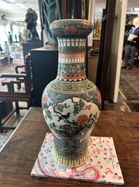 A pair of Chinese famille verte vases with birds among blossoming branches, Chenghua mark, 19th C.
