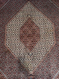 Een Perzisch Bidjar tapijt met floraal decor, wol op katoen, 20ste eeuw