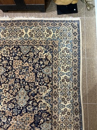 A Persian Nain rug with floral design, wool and silk on cotton, 20th C.