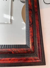 Een Vlaamse rechthoekige spiegel in schildpadfineer en ge&euml;boniseerd hout, 17de eeuw