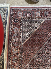 Een Perzisch Bidjar tapijt met floraal decor, wol op katoen, 20ste eeuw