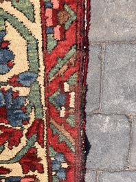 A Persian Bakhtiar rug with floral design, wool on cotton, 20th C.