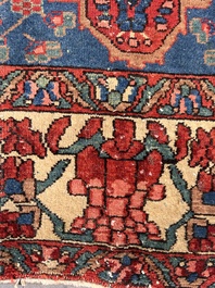 A Persian Bakhtiar rug with floral design, wool on cotton, 20th C.