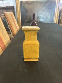 Trois vases en porcelaine monochrome jaune et sang-de-boeuf, un mont&eacute; en lampe, 19&egrave;me/20&egrave;me si&egrave;cle