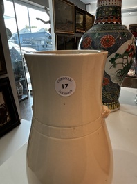 A Chinese white glazed 'hu' vase, 19th C.