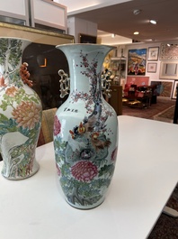 Two Chinese famille rose and qianjiang cai vases with birds among blossoming branches, 19th/20th C.