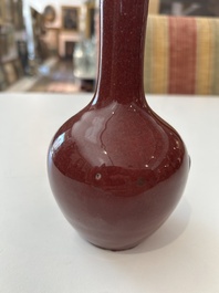 A Chinese flamb&eacute; glazed bottle vase, 19th C.