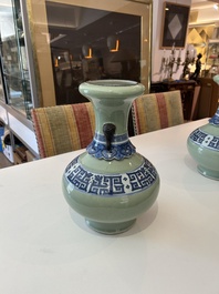 A pair of Chinese blue and white celadon 'kui dragons' vases, 19th/20th C.