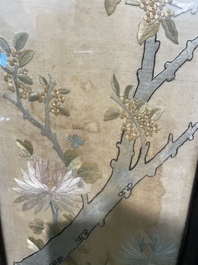 Four Chinese vertical silk embroideries with birds among blossoming branches, 20th C.