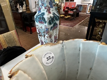 A pair of Chinese Canton famille rose vases with palace scenes and floral design, 19th C.